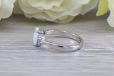 Very sparkly and fiery Opal and cubic zirconia set dress ring, solid sterling silver ring further rhodium plated for that platinum look