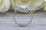 Very sparkly and fiery Opal and cubic zirconia set dress ring, solid sterling silver ring further rhodium plated for that platinum look