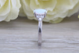 Very sparkly and fiery Opal and cubic zirconia set dress ring, solid sterling silver ring further rhodium plated for that platinum look