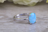 Very sparkly and fiery Opal solitaire, solid sterling silver ring further rhodium plated for that platinum look