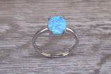 Very sparkly and fiery Opal solitaire, solid sterling silver ring further rhodium plated for that platinum look