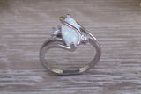 Very sparkly and fiery Opal and cubic zirconia set dress ring, solid sterling silver ring further rhodium plated for that platinum look