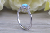 Very sparkly and fiery Opal and cubic zirconia set halo ring, solid sterling silver ring further rhodium plated for that platinum look