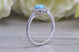 Very sparkly and fiery Opal and cubic zirconia set halo ring, solid sterling silver ring further rhodium plated for that platinum look