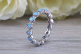 Very sparkly and fiery Opal full circle set ring, solid sterling silver ring further rhodium plated for that platinum look