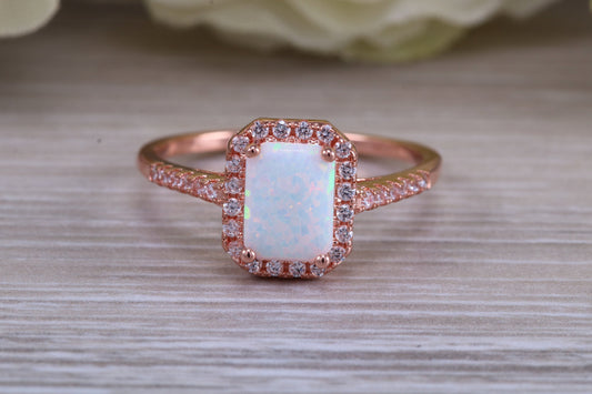 Very sparkly and fiery Opal and cubic zirconia set dress ring, solid sterling silver ring further 18ct rose gold plated