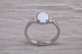 Very sparkly and fiery Opal and cubic zirconia set dress ring, solid sterling silver ring further rhodium plated for that platinum look