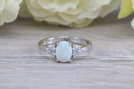 Very sparkly and fiery Opal and cubic zirconia set dress ring, solid sterling silver ring further rhodium plated for that platinum look