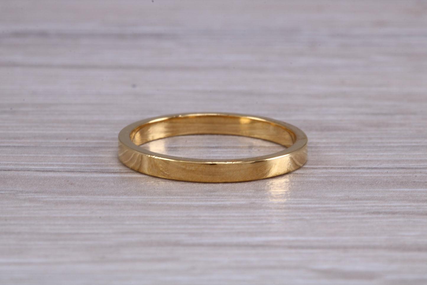 2 mm flat profile Silver band with 18ct yellow Gold hard plating, looks just like a gold band for a fraction of the cost