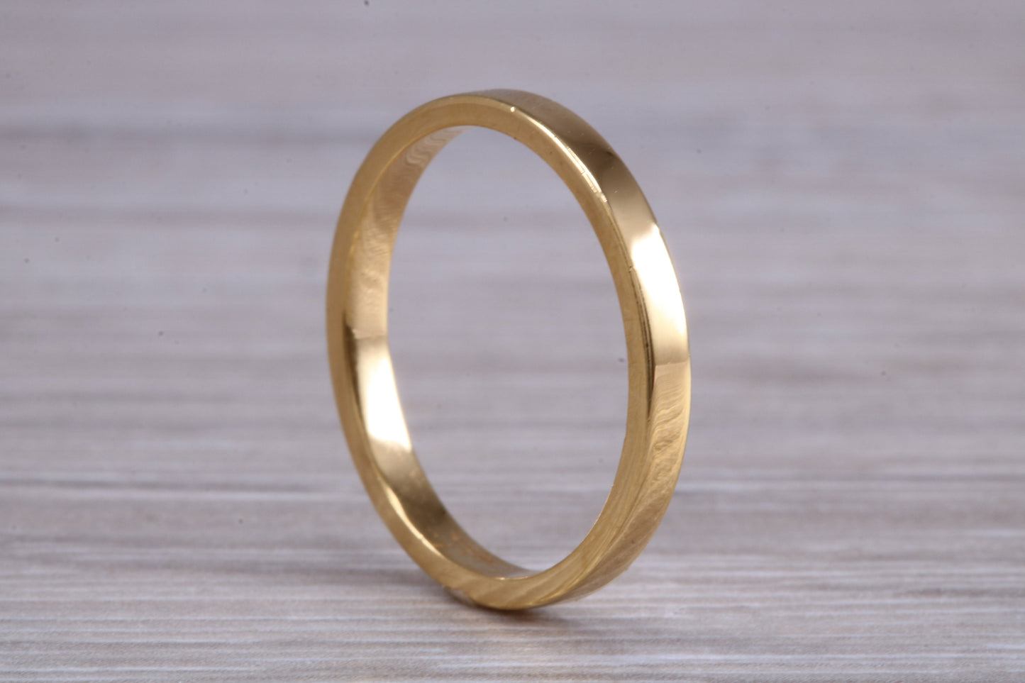 2 mm flat profile Silver band with 18ct yellow Gold hard plating, looks just like a gold band for a fraction of the cost