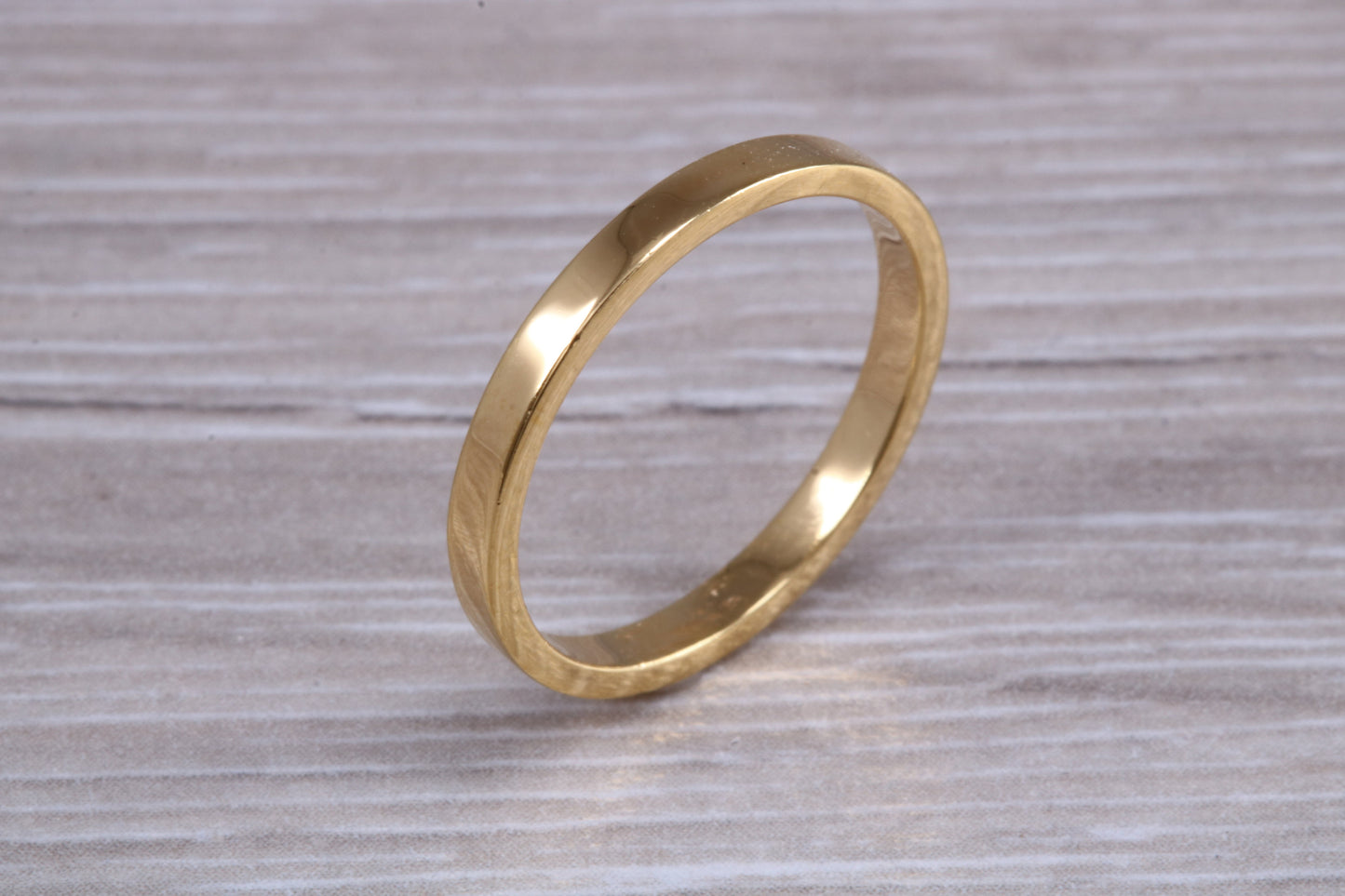 2 mm flat profile Silver band with 18ct yellow Gold hard plating, looks just like a gold band for a fraction of the cost