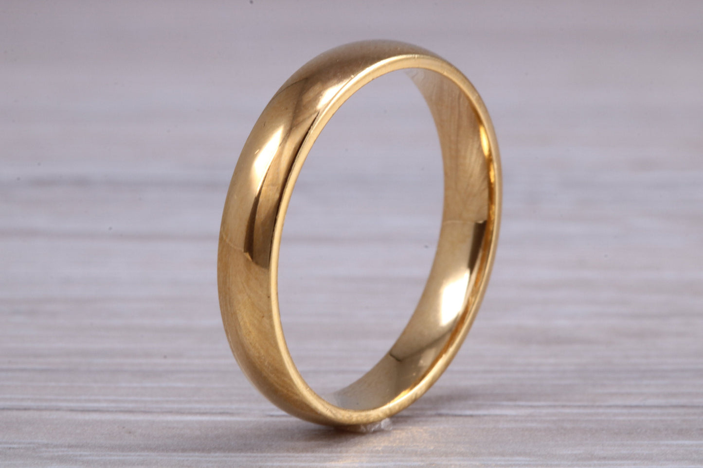 4 mm court profile Silver band with 18ct yellow Gold hard plating, looks just like a gold band for a fraction of the cost