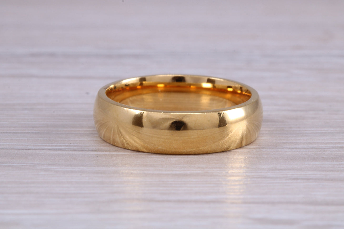 6 mm court profile Silver band with 18ct yellow Gold hard plating, looks just like a gold band for a fraction of the cost