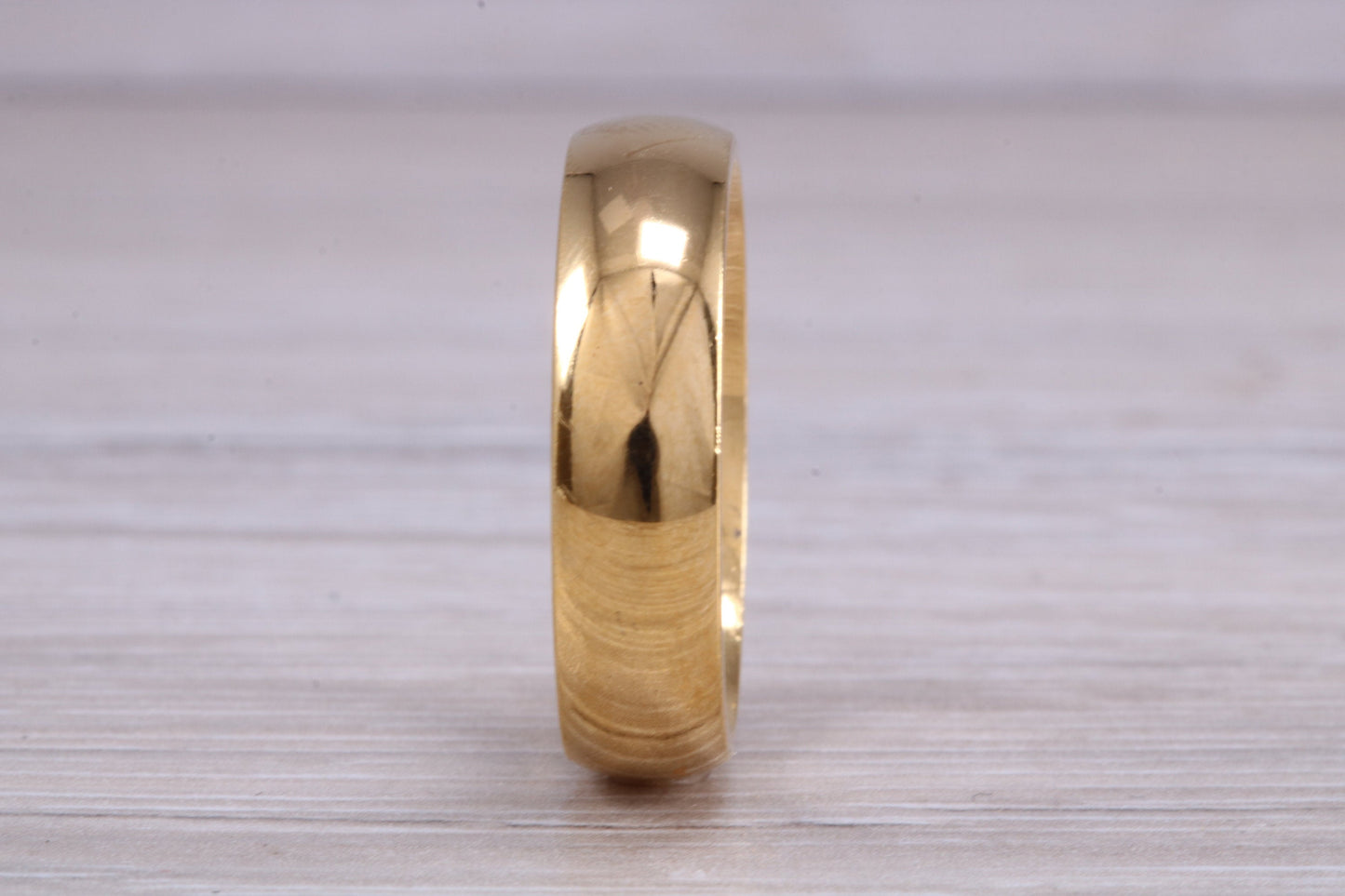 6 mm court profile Silver band with 18ct yellow Gold hard plating, looks just like a gold band for a fraction of the cost
