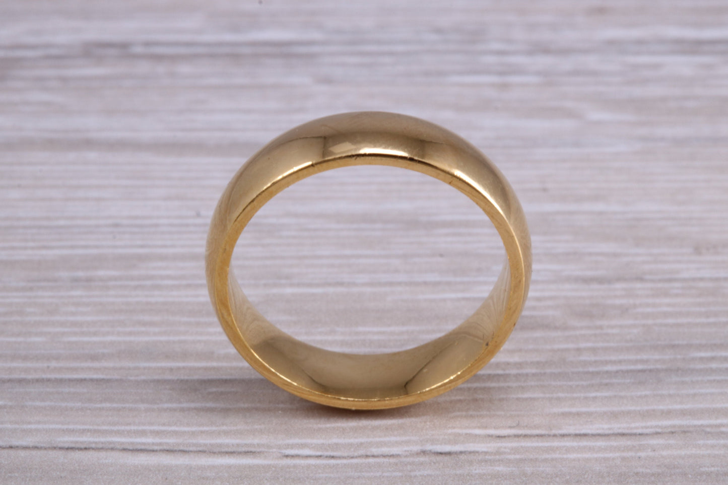 6 mm court profile Silver band with 18ct yellow Gold hard plating, looks just like a gold band for a fraction of the cost