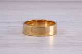 6 mm flat profile Silver band with 18ct yellow Gold hard plating, looks just like a gold band for a fraction of the cost