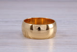 8 mm court profile Silver band with 18ct yellow Gold hard plating, looks just like a gold band for a fraction of the cost. Very wide band