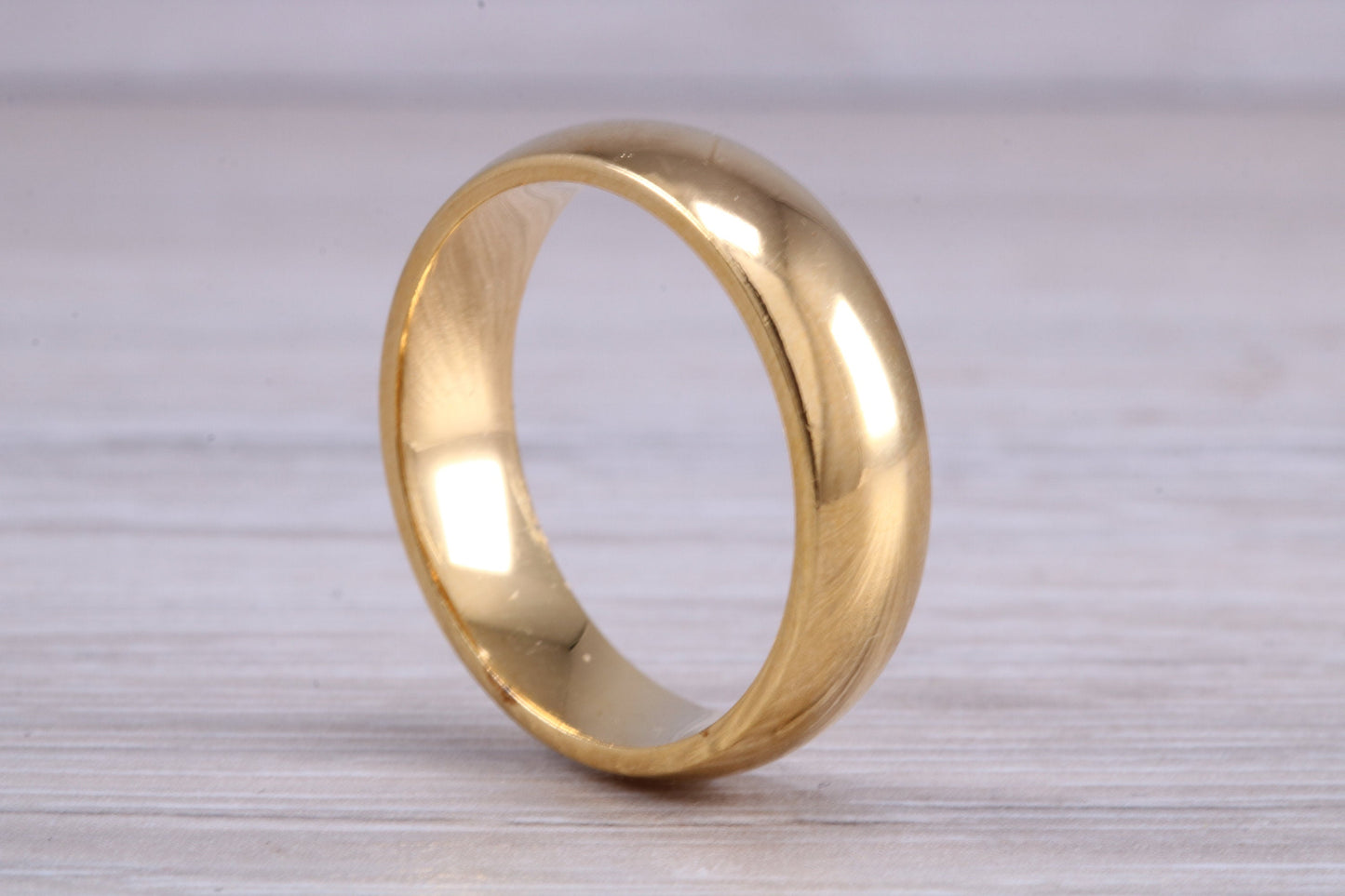 6 mm court profile Silver band with 18ct yellow Gold hard plating, looks just like a gold band for a fraction of the cost