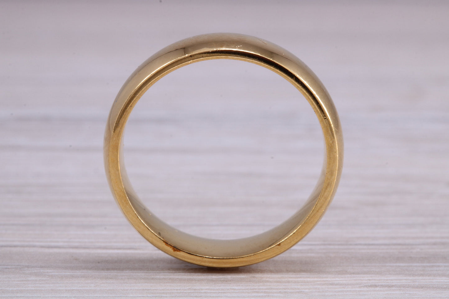 6 mm court profile Silver band with 18ct yellow Gold hard plating, looks just like a gold band for a fraction of the cost