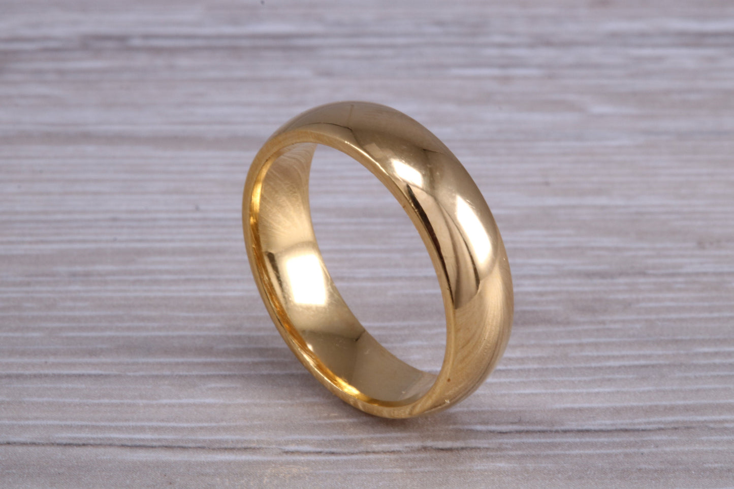 6 mm court profile Silver band with 18ct yellow Gold hard plating, looks just like a gold band for a fraction of the cost