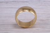 8 mm court profile Silver band with 18ct yellow Gold hard plating, looks just like a gold band for a fraction of the cost. Very wide band