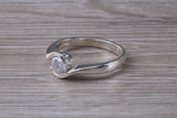 Simple and very elegant real Diamond look ring, sterling silver set with half carat diamond look C Z, very smooth rub over setting