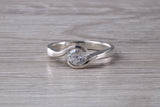 Simple and very elegant real Diamond look ring, sterling silver set with half carat diamond look C Z, very smooth rub over setting