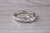 Simple and very elegant real Diamond look ring, sterling silver set with half carat diamond look C Z, very smooth rub over setting
