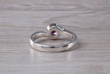 Simple and very elegant real Amethyst look ring, sterling silver set with half carat Amethyst look C Z, very smooth rub over setting