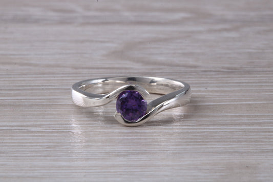 Simple and very elegant real Amethyst look ring, sterling silver set with half carat Amethyst look C Z, very smooth rub over setting