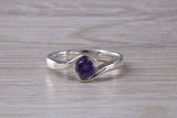 Simple and very elegant real Amethyst look ring, sterling silver set with half carat Amethyst look C Z, very smooth rub over setting