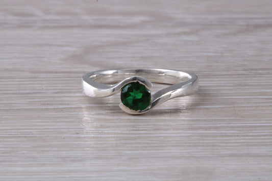 Simple and very elegant real Emerald look ring, sterling silver set with half carat Emerald C Z, very smooth rub over setting
