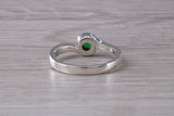 Simple and very elegant real Emerald look ring, sterling silver set with half carat Emerald C Z, very smooth rub over setting