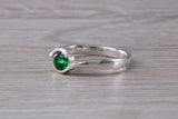 Simple and very elegant real Emerald look ring, sterling silver set with half carat Emerald C Z, very smooth rub over setting