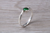 Simple and very elegant real Emerald look ring, sterling silver set with half carat Emerald C Z, very smooth rub over setting