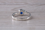 Simple and very elegant real Blue Sapphire look ring, sterling silver set with half carat Sapphire C Z, very smooth rub over setting
