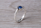 Simple and very elegant real Blue Sapphire look ring, sterling silver set with half carat Sapphire C Z, very smooth rub over setting