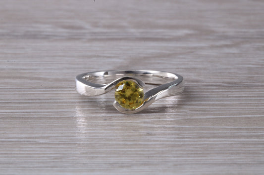 Simple and very elegant real Yellow Sapphire look ring, sterling silver set with half carat Sapphire C Z, very smooth rub over setting