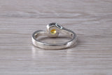 Simple and very elegant real Yellow Sapphire look ring, sterling silver set with half carat Sapphire C Z, very smooth rub over setting