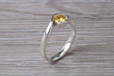 Simple and very elegant real Yellow Sapphire look ring, sterling silver set with half carat Sapphire C Z, very smooth rub over setting