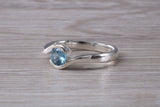 Simple and very elegant real Aquamarine look ring, sterling silver set with half carat Aquamarine C Z, very smooth rub over setting