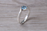 Simple and very elegant real Aquamarine look ring, sterling silver set with half carat Aquamarine C Z, very smooth rub over setting