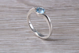Simple and very elegant real Aquamarine look ring, sterling silver set with half carat Aquamarine C Z, very smooth rub over setting