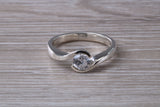 Simple and very elegant real Diamond look ring, sterling silver set with half carat diamond look C Z, very smooth rub over setting