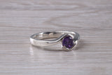 Simple and very elegant real Amethyst look ring, sterling silver set with half carat Amethyst look C Z, very smooth rub over setting