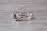 Simple and very elegant real Amethyst look ring, sterling silver set with half carat Amethyst look C Z, very smooth rub over setting