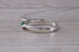 Simple and very elegant real Emerald look ring, sterling silver set with half carat Emerald C Z, very smooth rub over setting