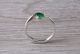 Simple and very elegant real Emerald look ring, sterling silver set with half carat Emerald C Z, very smooth rub over setting