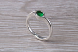 Simple and very elegant real Emerald look ring, sterling silver set with half carat Emerald C Z, very smooth rub over setting