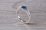 Simple and very elegant real Blue Sapphire look ring, sterling silver set with half carat Sapphire C Z, very smooth rub over setting